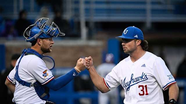 Reese Dutton Fist-Bumping Catcher Jake English